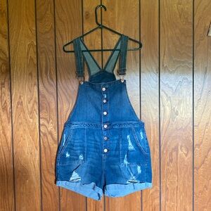 XXL distressed romper. Doesn’t ride up and fits very nicely.